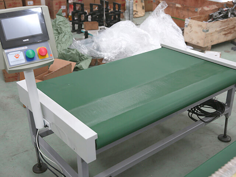 Automatic counting machine for PVC/nitrile glove production line